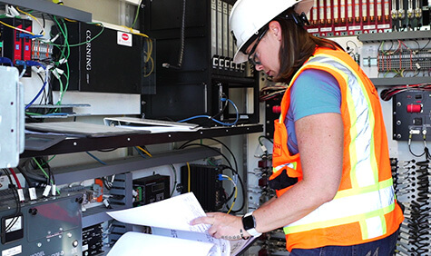 A worker checking a system.
