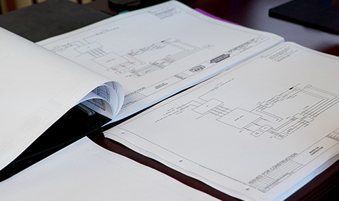 Planning documents on a table.